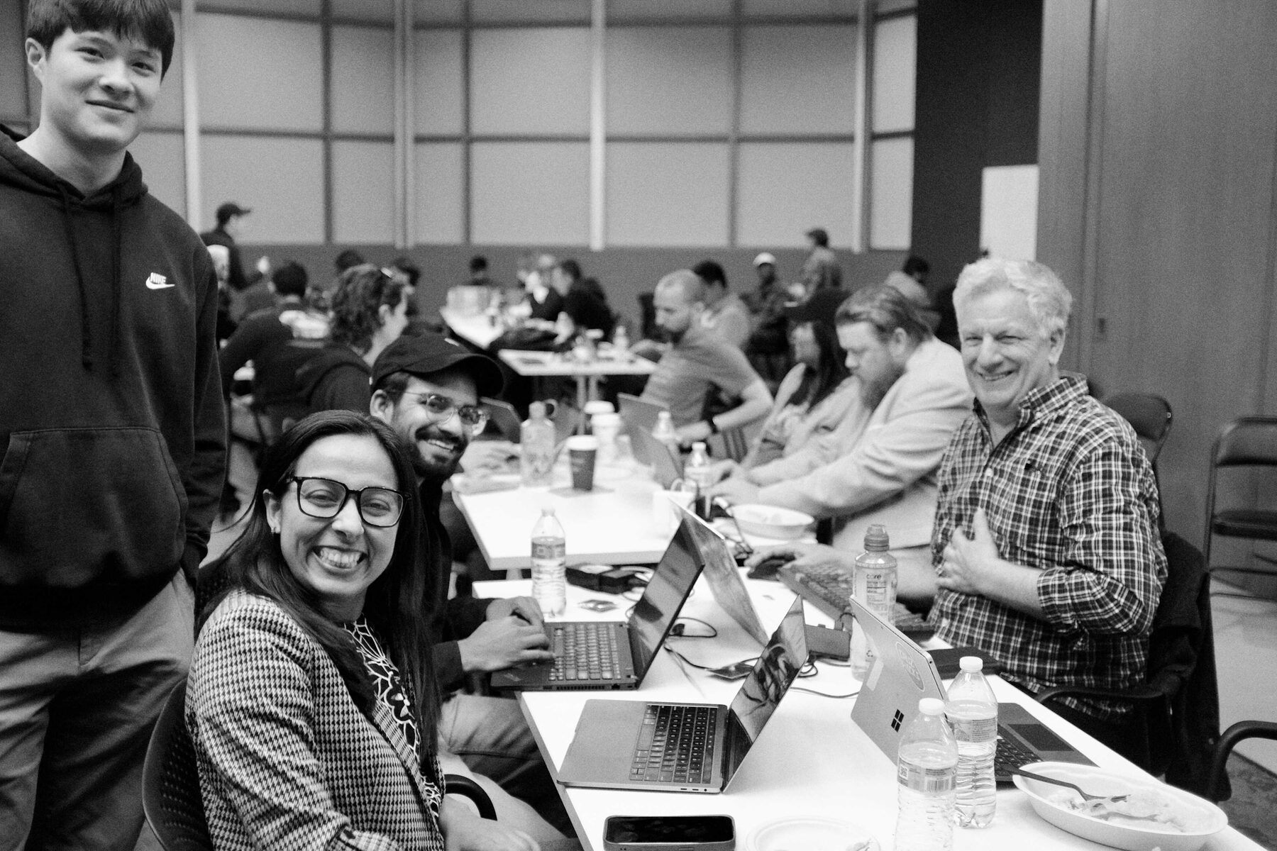 A participant team smiling together during the San Diego Impact Lab